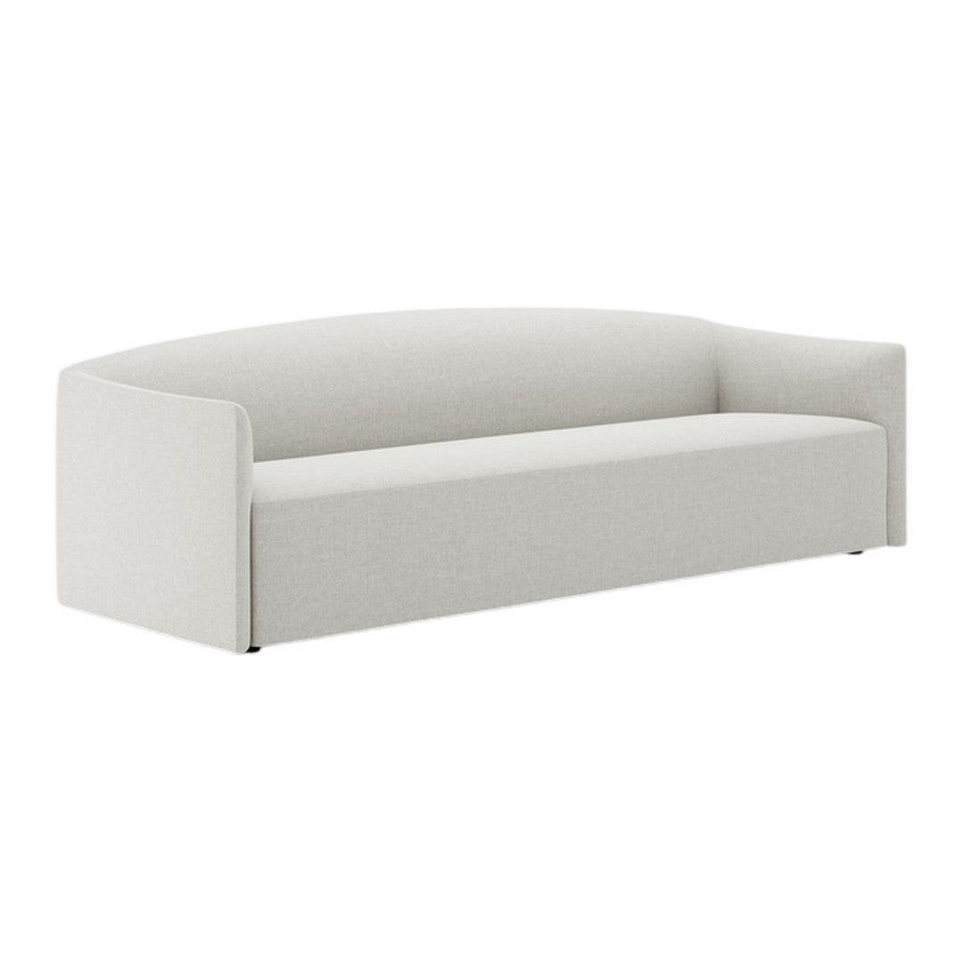 Elegant curved sofa in soft white fabric, featuring a smooth, minimalist design with no visible patterns.