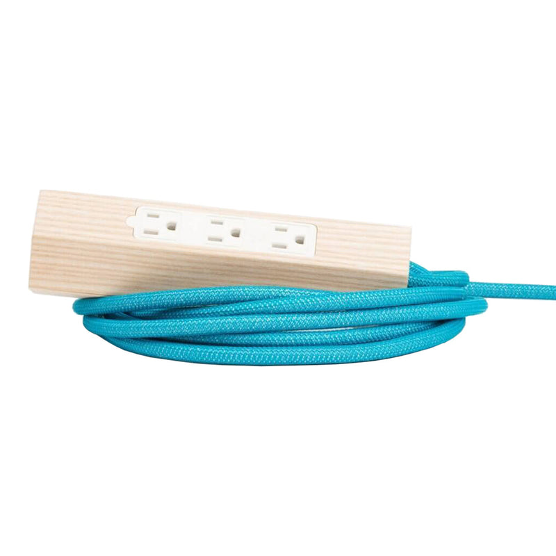 "Turquoise braided power cord with a wooden outlet, featuring a sleek, modern design."