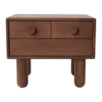 Wooden bedside table in rich brown with smooth finish, featuring two round drawer knobs and round legs.