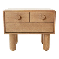 Light oak nightstand with two drawers and circular knobs, featuring a smooth, minimalist design.
