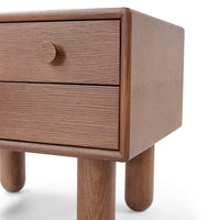 Wooden nightstand featuring a rich brown finish and a textured grain pattern, with rounded legs and a single drawer.