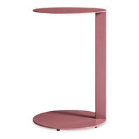 Modern pink side table with a sleek, minimal design and smooth circular surfaces. Perfect for contemporary decor.