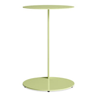 Lime green metal side table with a sleek circular top and base, perfect for modern decor.