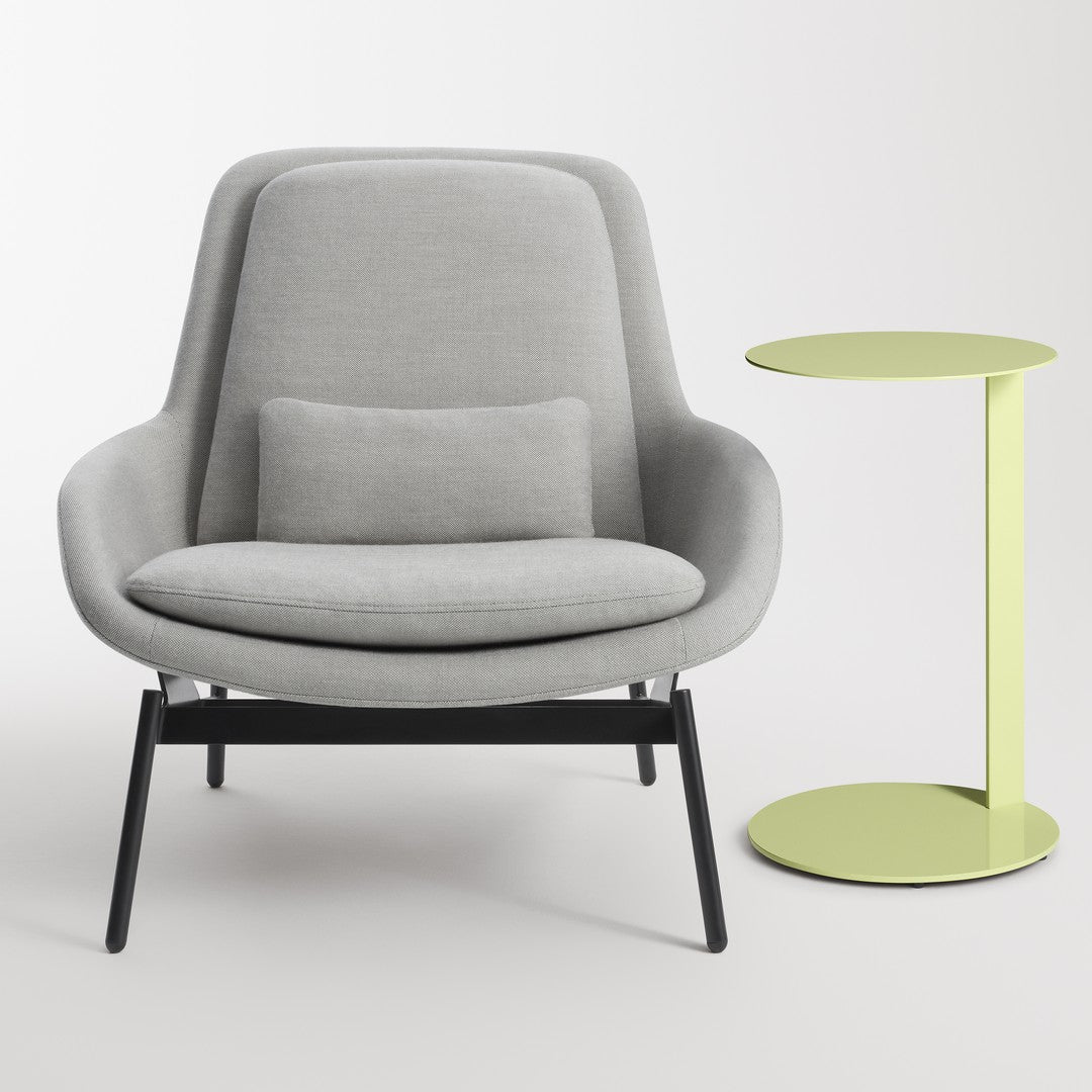Modern gray armchair with a black frame and a vibrant yellow side table. Perfect blend of subtle and bold colors.