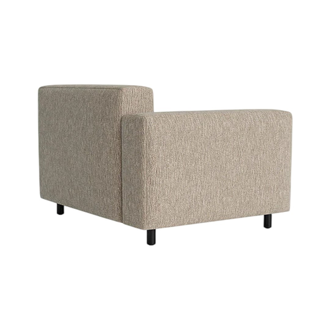 Beige textured fabric sofa with clean lines, featuring black legs and a modern, minimalist design.