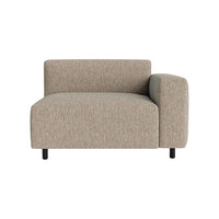 Beige textured fabric armchair with a minimalist design and clean lines, featuring a sleek black leg base.
