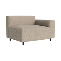 Beige upholstered chair in a simple, modern design with a textured fabric pattern and black metal legs.