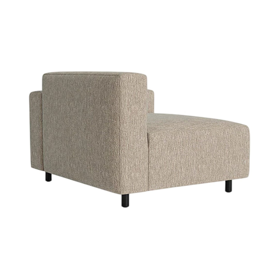 Beige patterned upholstery chaise lounge with black legs, showcasing a modern, textured design.