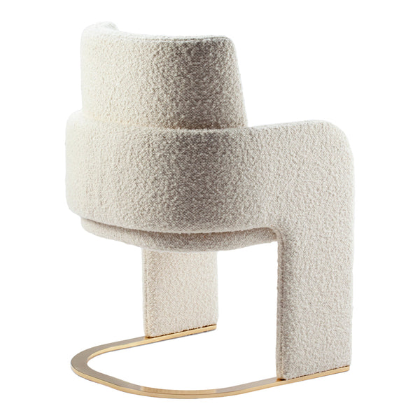 Textured cream-colored chair with a modern design and soft, fuzzy finish. Elegant gold base adds a touch of luxury.