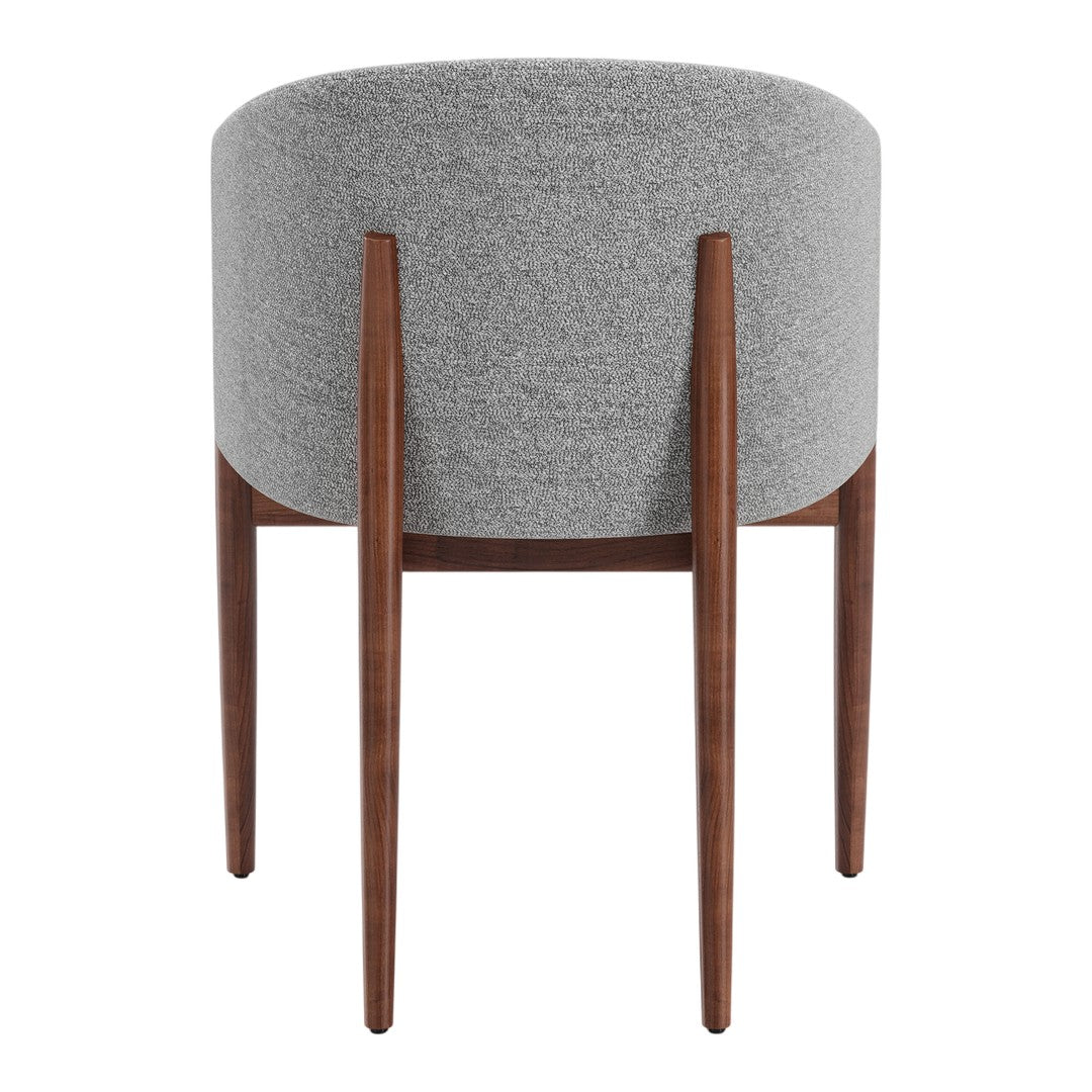 Round gray upholstered stool with sleek brown wooden legs, ideal for modern decor.