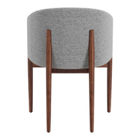 Round gray upholstered stool with sleek brown wooden legs, ideal for modern decor.