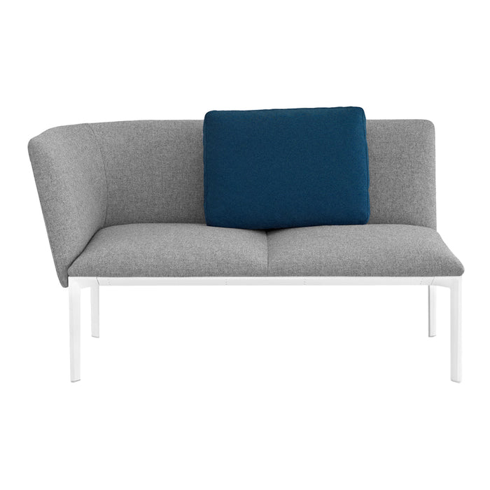 Gray two-seater sofa with a deep blue accent cushion and sleek white legs. Modern minimalist design.
