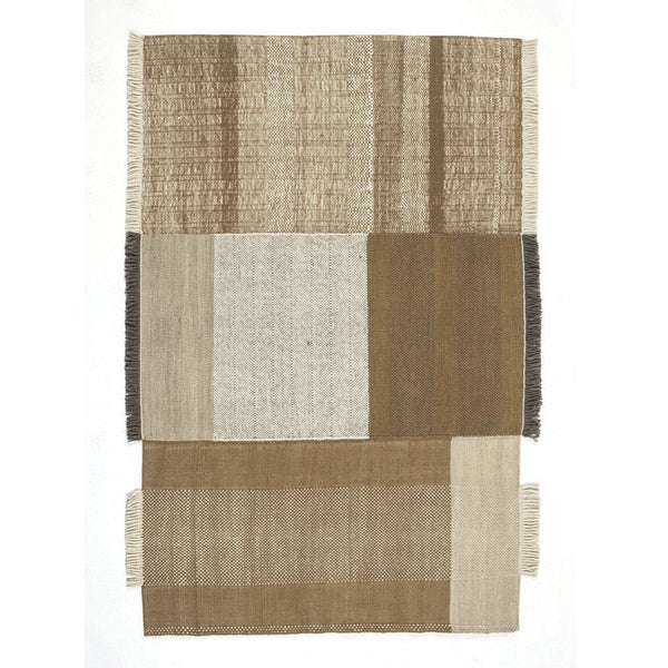 Textured area rug featuring warm beige, light cream, and rich brown color blocks with a woven pattern.