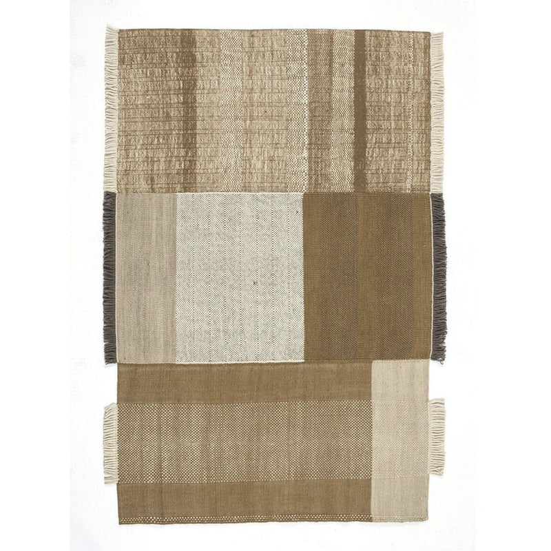 Textured area rug featuring warm beige, light cream, and rich brown color blocks with a woven pattern.
