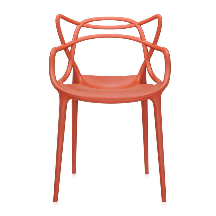 Bright coral chair with unique, modern design and playful arm patterns. Stylish and bold for any space.