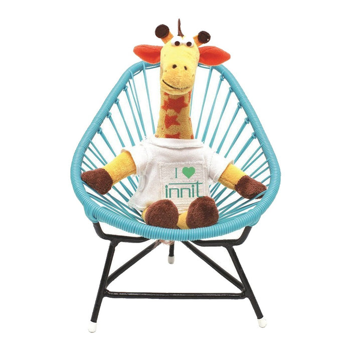 Plush giraffe in a white shirt sits in a teal chair with a distinctive wire pattern, adding playful color to any space.