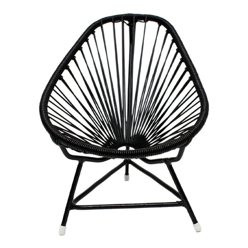 Black Acapulco chair featuring a unique geometric pattern with sleek lines and modern design. Perfect for stylish decor.