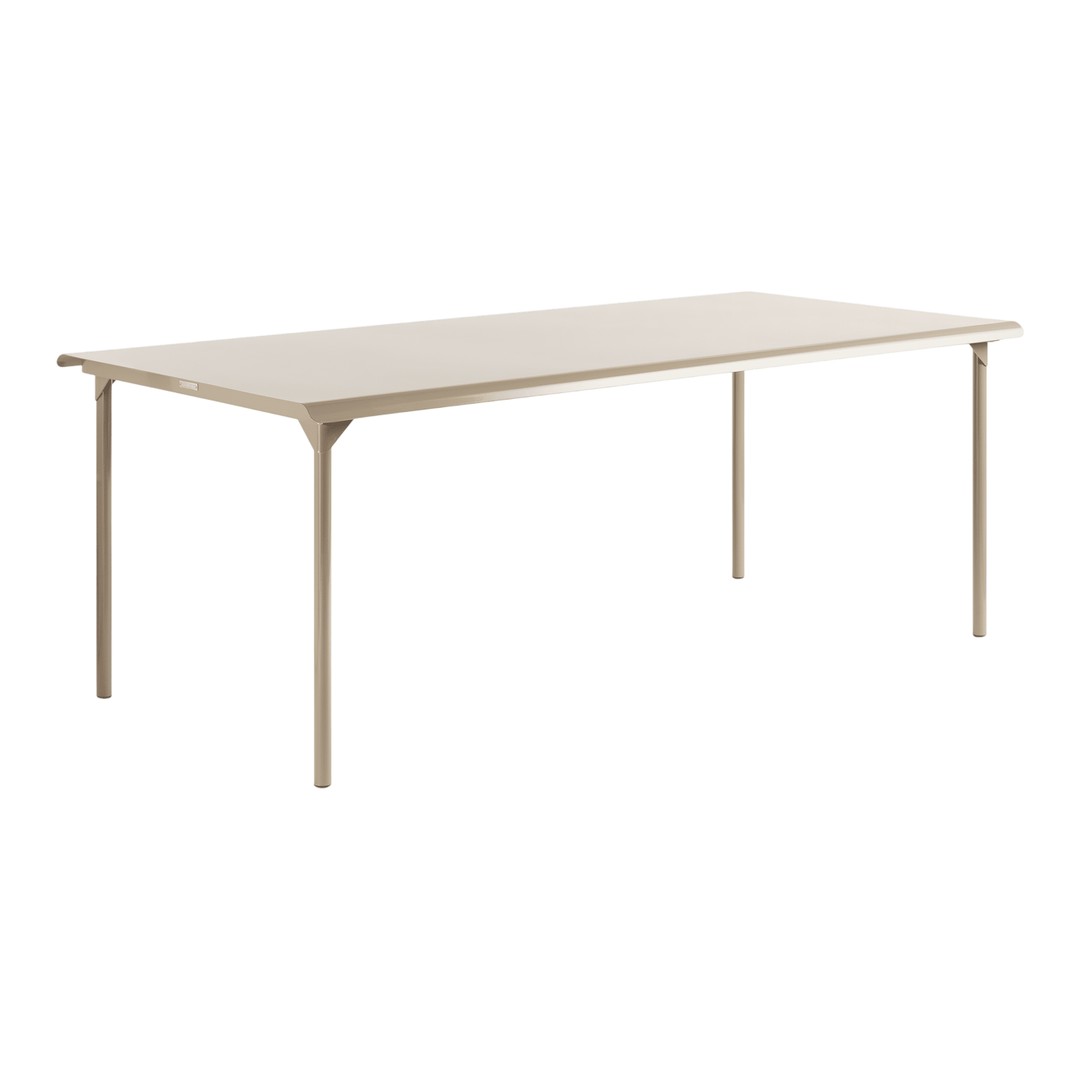 Neutral beige rectangular table with a smooth, minimalist design and sturdy metal legs. Ideal for modern dining spaces.