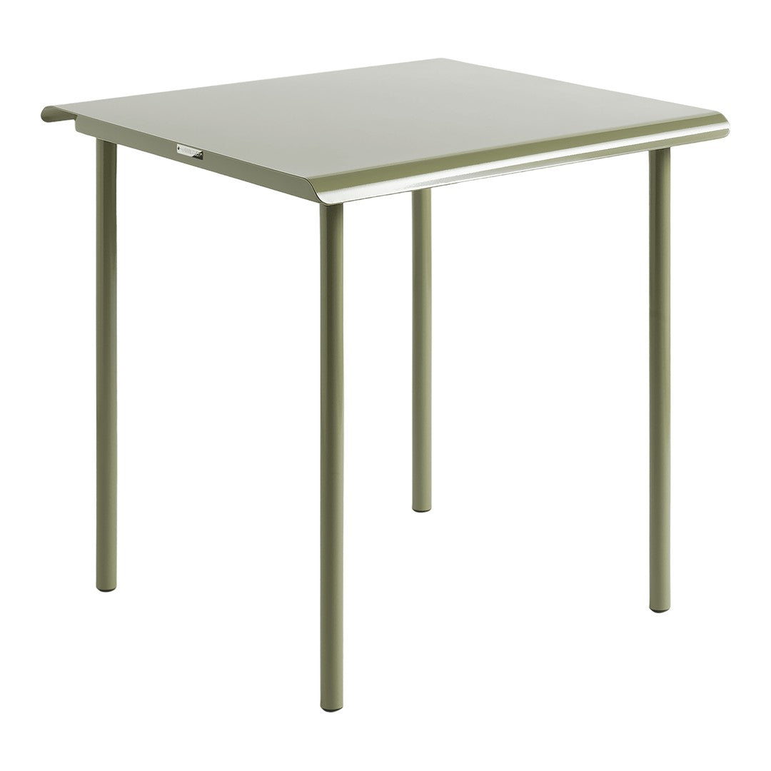Green square table with a sleek, minimalist design and smooth surface. Ideal for modern decor.