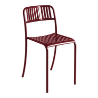 Rustic burgundy metal chair with sleek slatted design and minimalist style, perfect for modern decor.