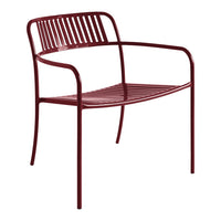 Burgundy metal chair with sleek, minimalist design and vertical slat pattern for modern decor.