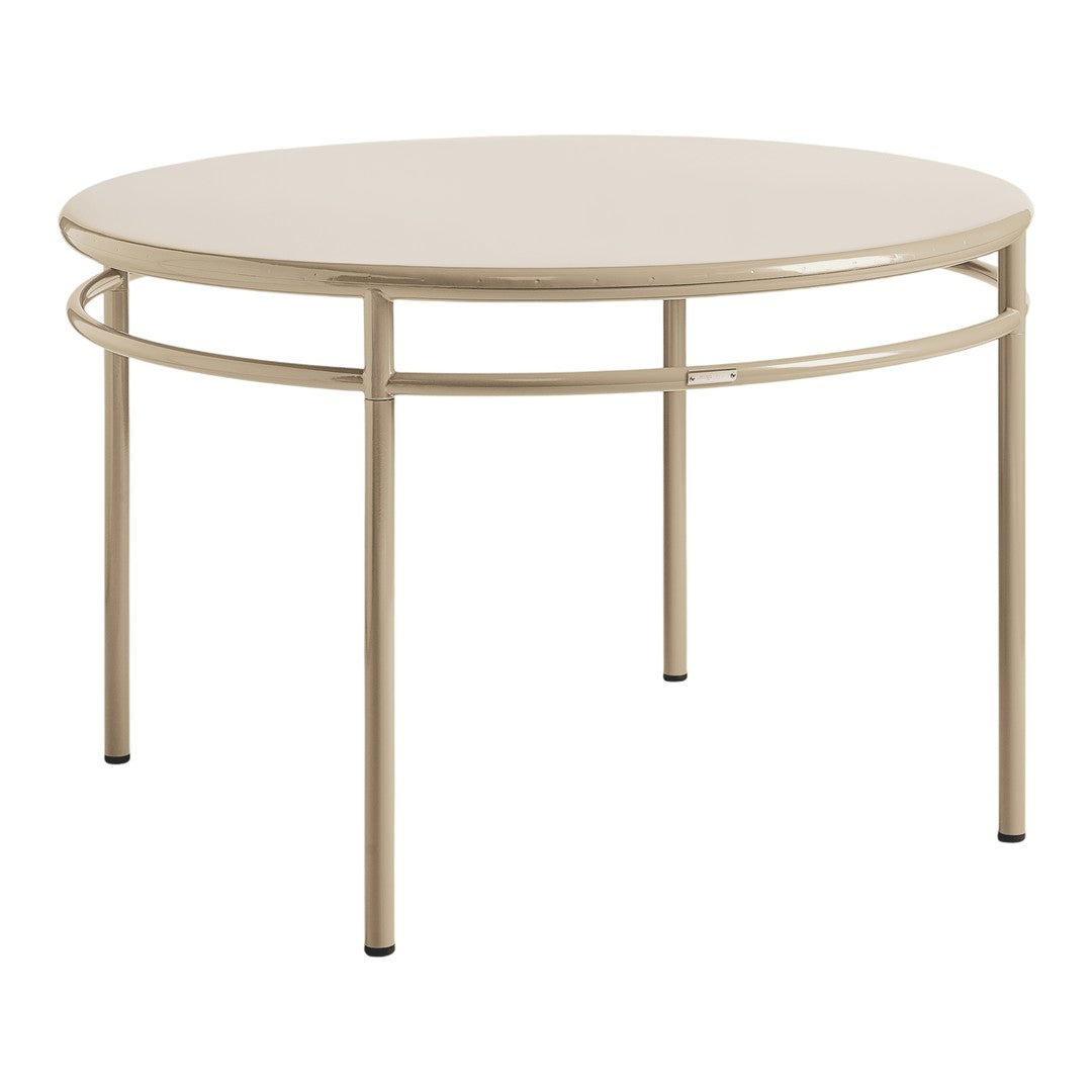 Round beige table with a sleek, minimalist design and smooth surface, complemented by sturdy metal legs.
