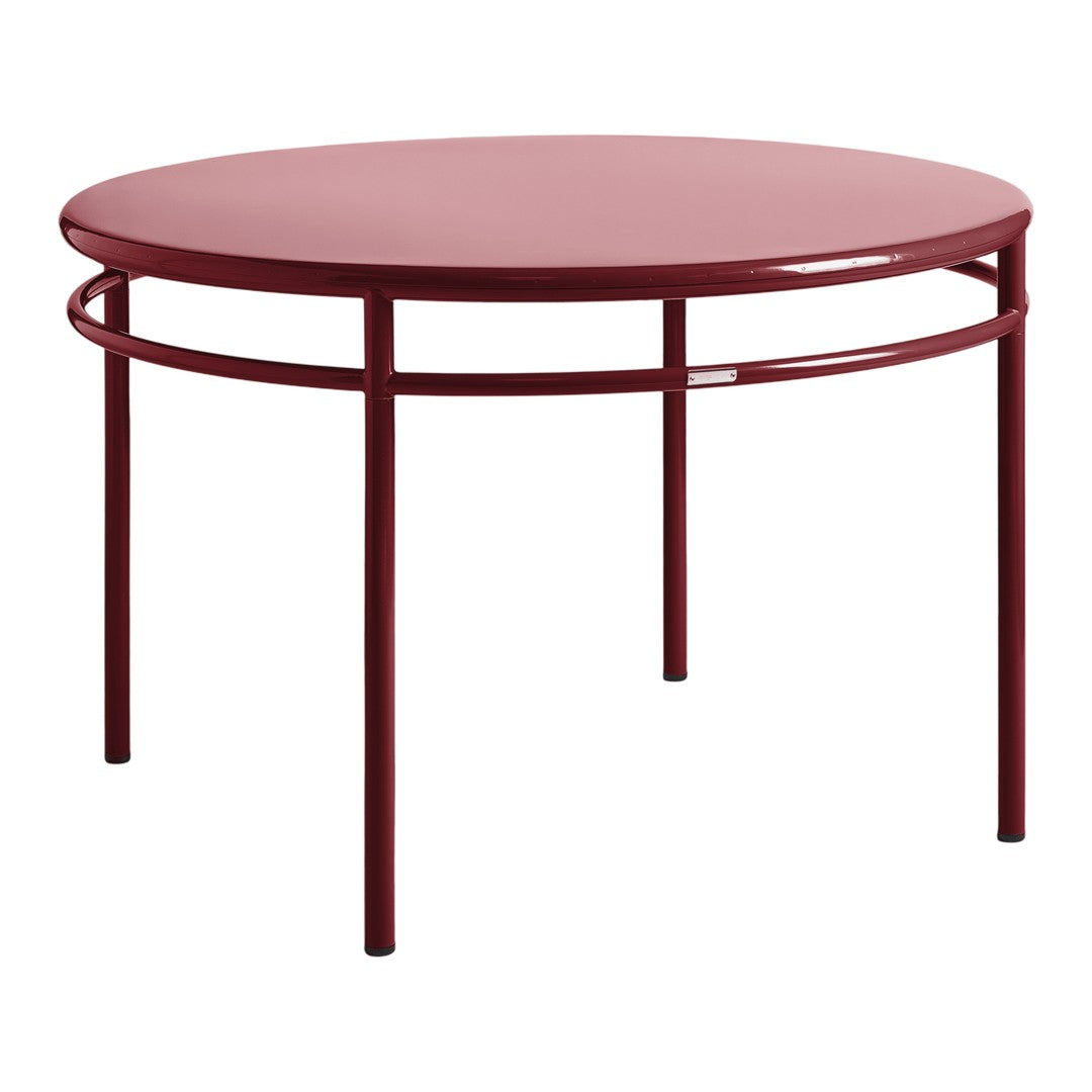 Round burgundy coffee table with a sleek, modern design and minimalistic metal frame. Perfect for contemporary decor.