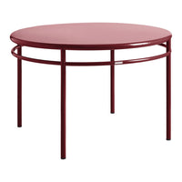 Round burgundy coffee table with a sleek, modern design and minimalistic metal frame. Perfect for contemporary decor.