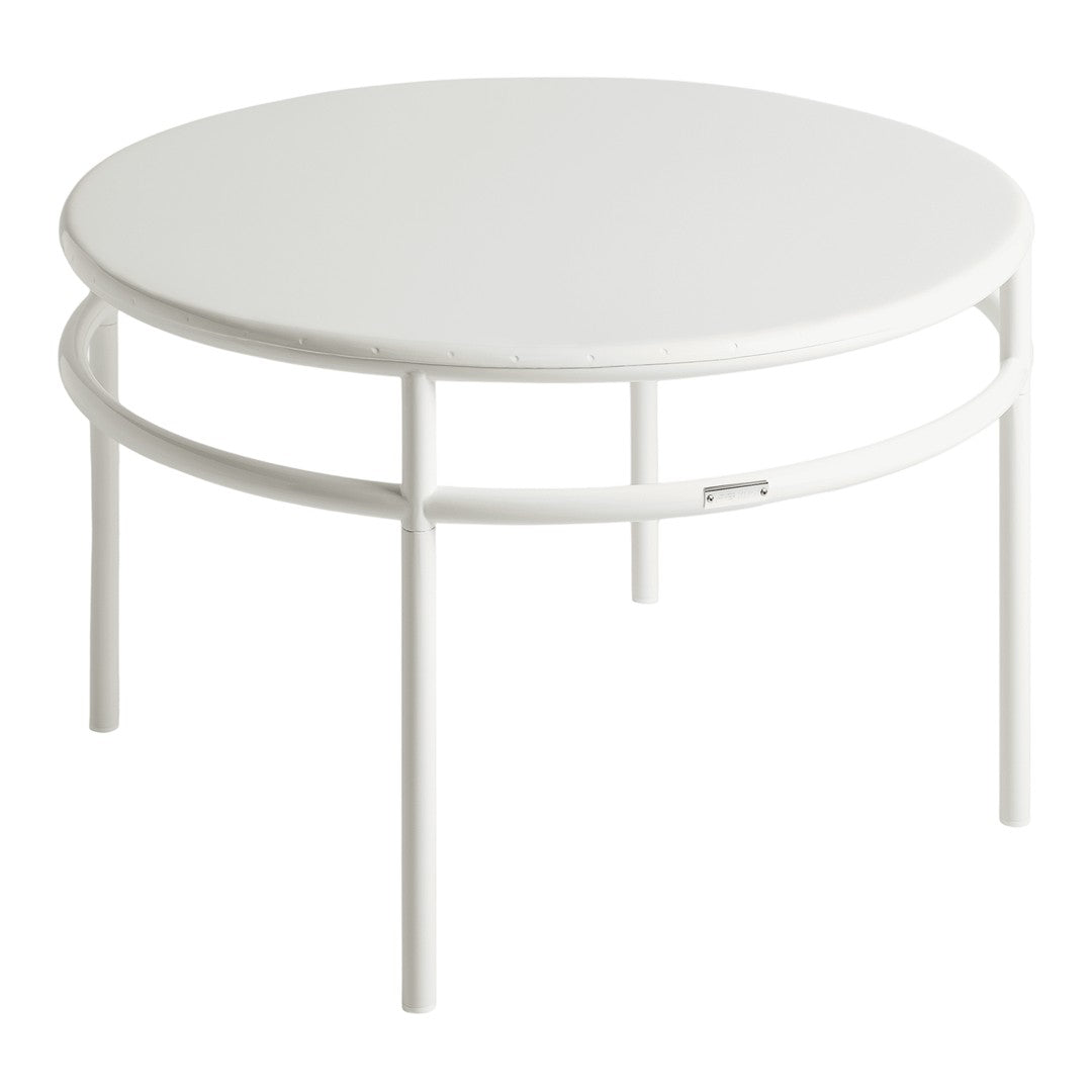White round coffee table with a sleek, minimalist design and smooth surface, featuring a circular frame.