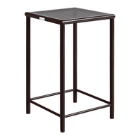 Black metal bar table with a textured pattern on the top surface and sleek, minimalistic design.