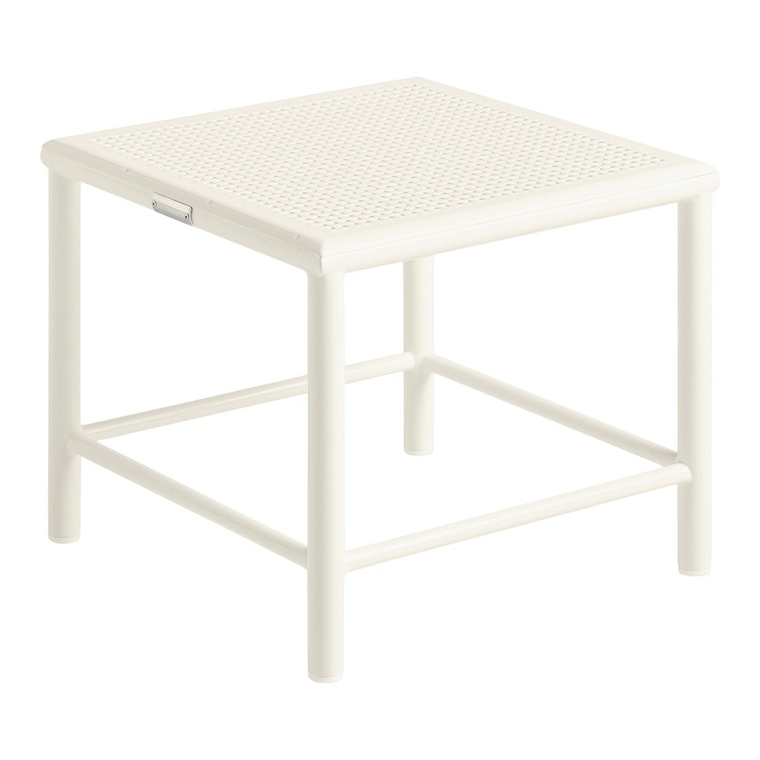White square side table with a textured surface, complemented by a simple, understated design.