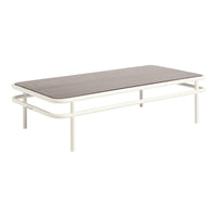 Modern coffee table featuring a dark wooden top and a sleek white metal frame, combining minimalism with elegance.