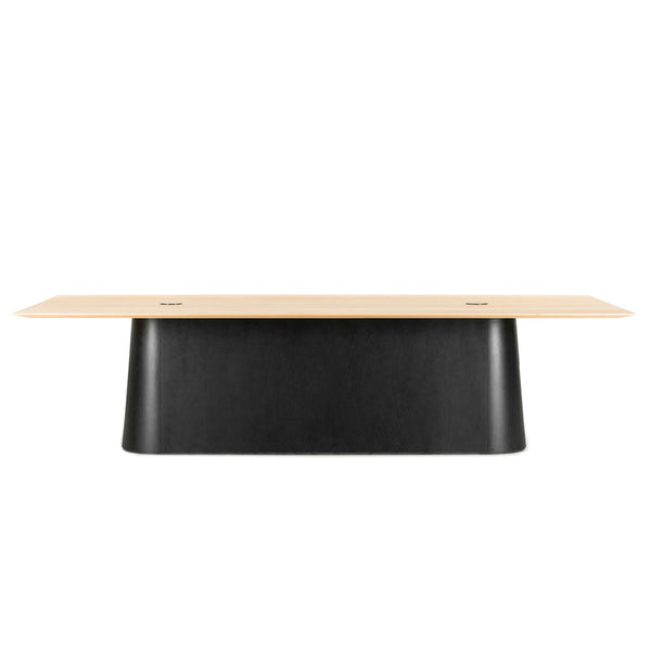 Black and light wood table with a smooth finish and modern design, showcasing minimalistic elegance.