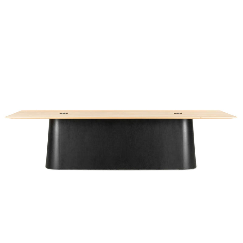 Black and light wood table with a smooth finish and modern design, showcasing minimalistic elegance.