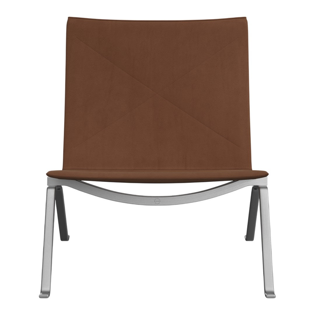 Brown minimalist lounge chair with a sleek silver frame and simple geometric design. Perfect for modern decor.