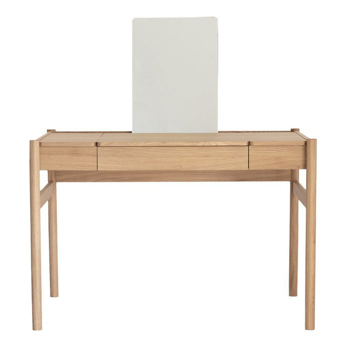 Light wood desk with a smooth natural finish and a sleek white backdrop, featuring minimalistic design and no patterns.