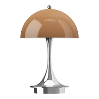 Modern lamp with a glossy brown dome shade and sleek silver base. Elegant design featuring smooth curves.