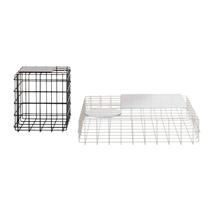 "Black and white wire storage baskets with geometric patterns, perfect for organizing items stylishly."