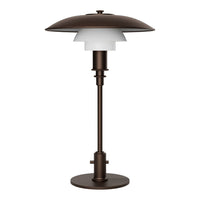 Brown metal table lamp with layered white glass shade and sleek, modern design. Ideal for any contemporary space.