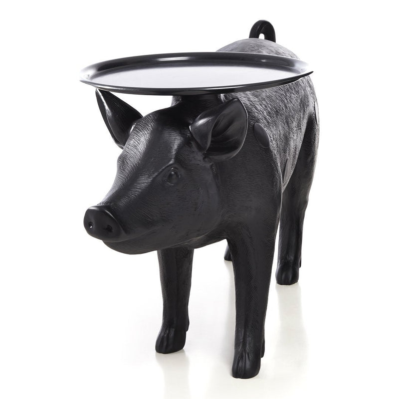 Black pig-shaped table with a glossy black tray, featuring a textured finish and playful design.