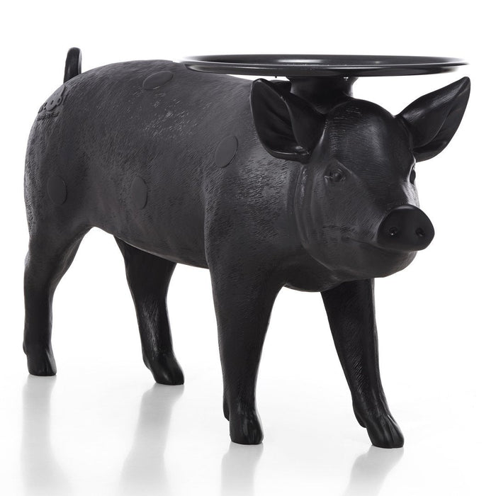 Black ceramic pig-shaped stool with glossy finish, featuring a round tray on its back. Perfect for rustic decor.