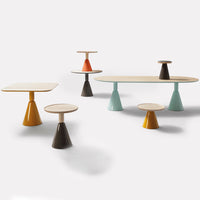 Colorful modern tables featuring teal, orange, brown, and yellow in unique geometric patterns. Perfect for stylish decor.