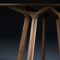 Pivot Round Dining Table