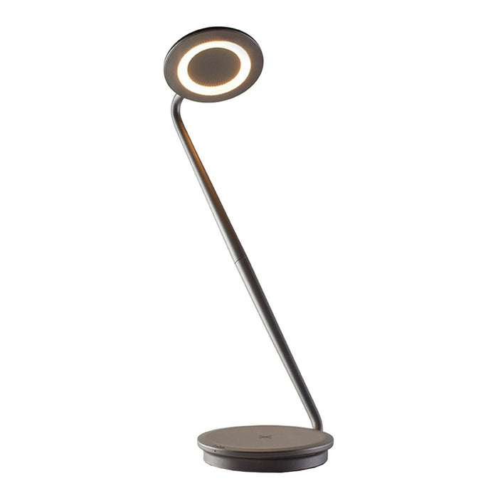 Modern desk lamp featuring a sleek, black body with a circular light ring. Minimalist design for contemporary decor.