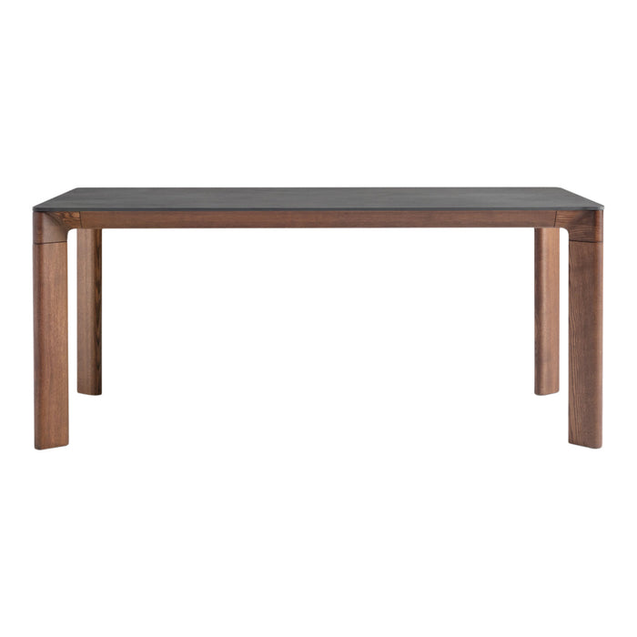 Stylish wooden dining table with a dark surface and warm brown legs, showcasing a sleek, modern design.