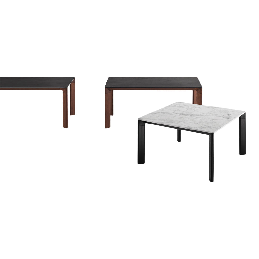 "Modern coffee tables in black, walnut, and white marble with sleek, minimalistic designs."