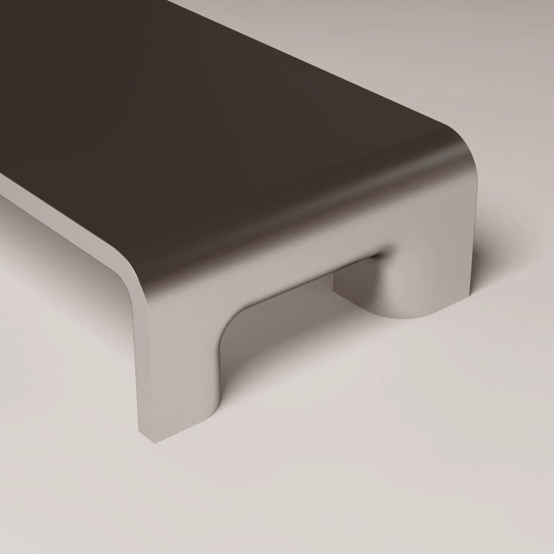 Minimalist gray and beige bench with smooth, sleek edges and a modern design. Ideal for contemporary spaces.