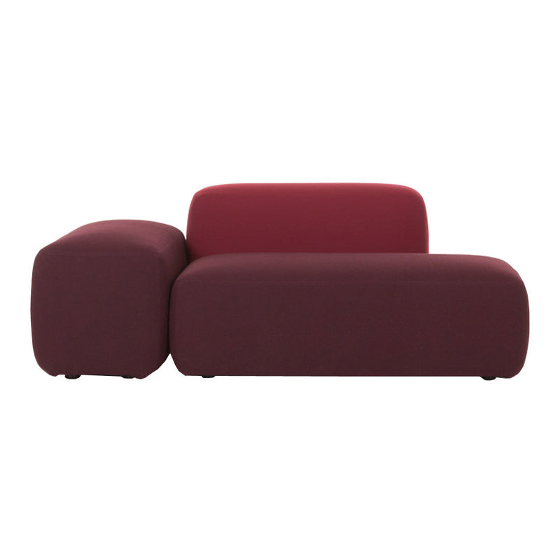 Maroon sofa with smooth, minimalist design featuring a rounded armrest and seamless upholstery pattern.