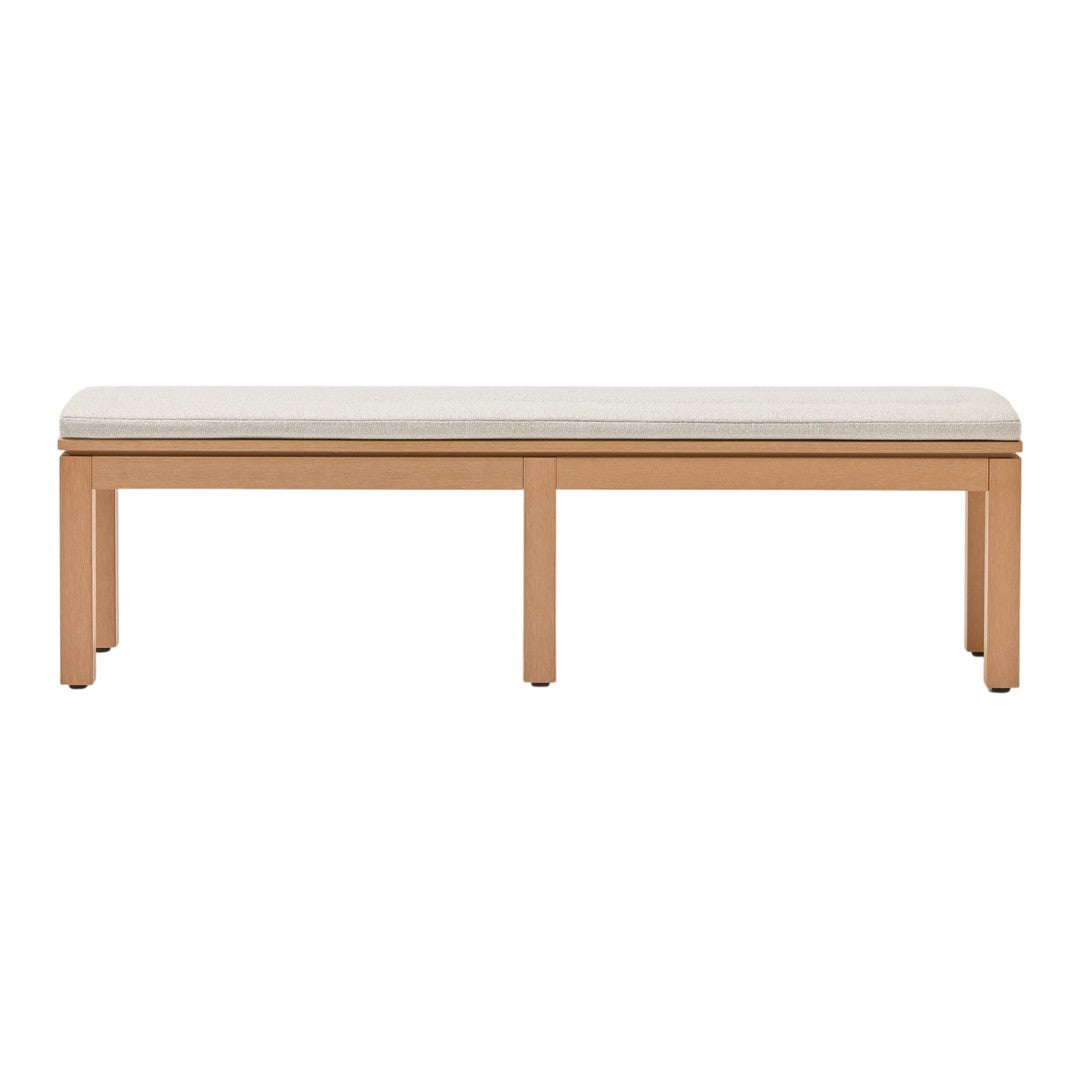 Light-colored fabric upholstered bench with a natural wood frame, featuring a minimalist design and clean lines.