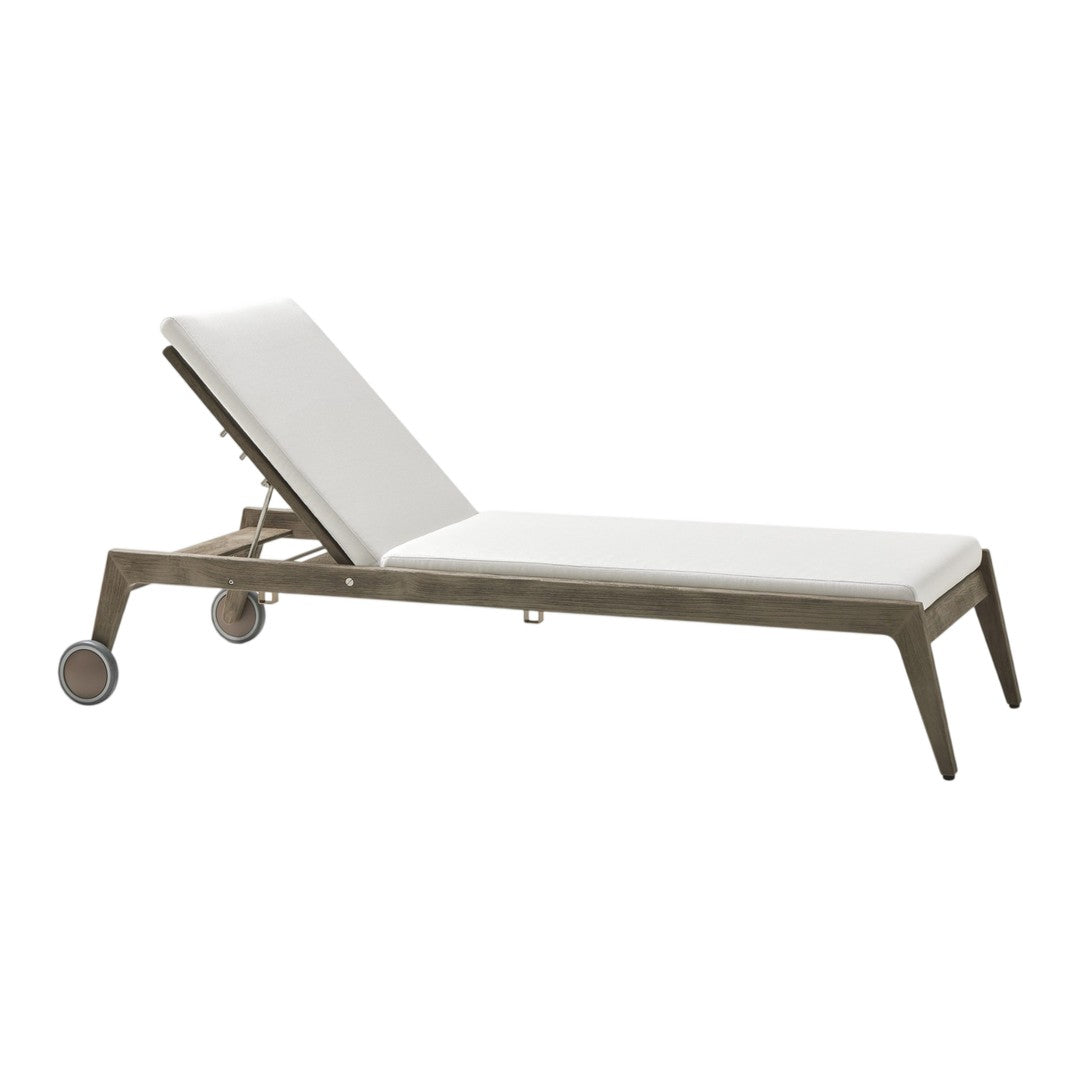 White reclining lounge chair with light gray frame and subtle texture. Ideal for outdoor relaxation.